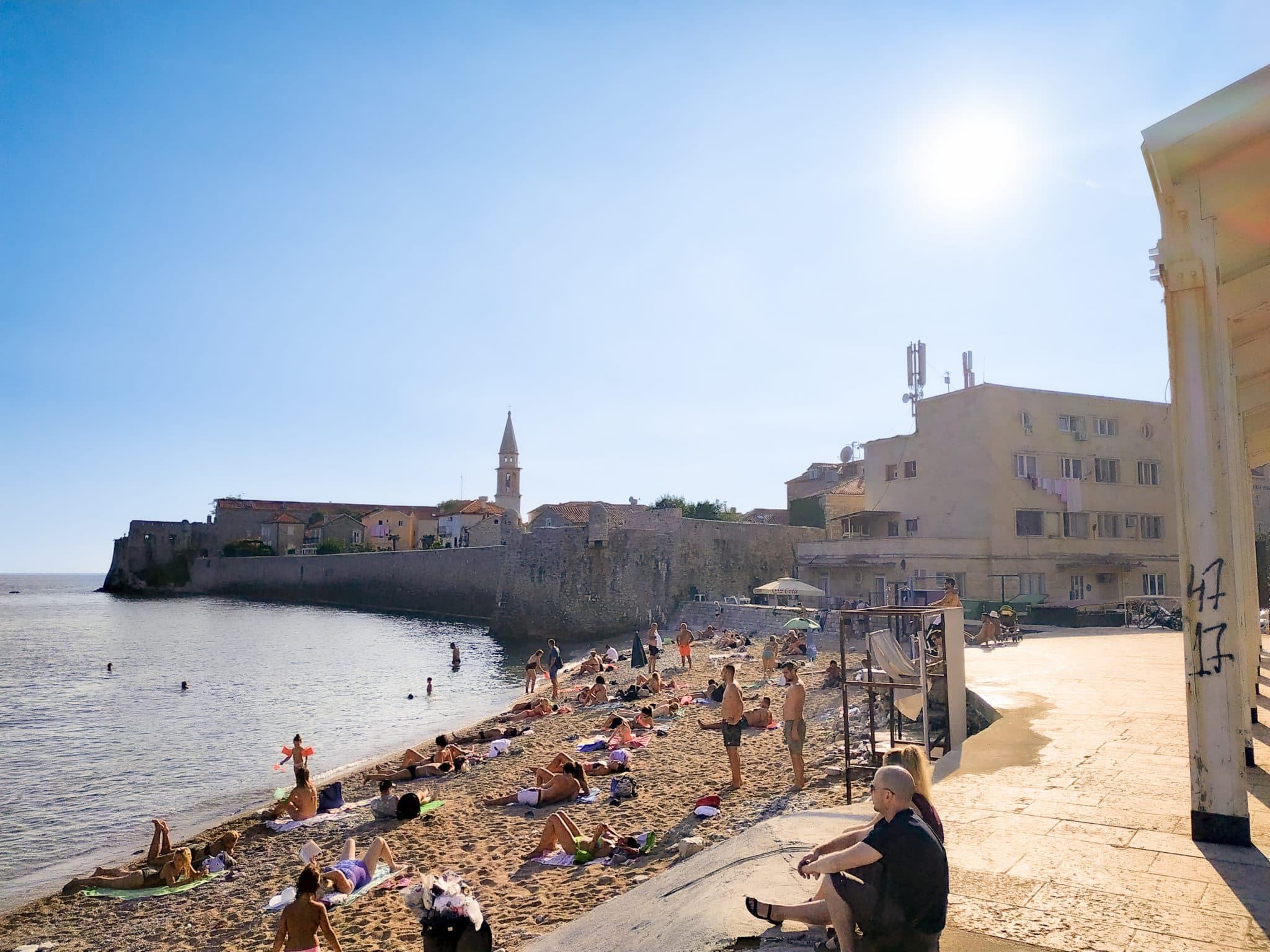 Pizana beach - a small city beach near the walls of the Old Town of Budva in Montenegro.