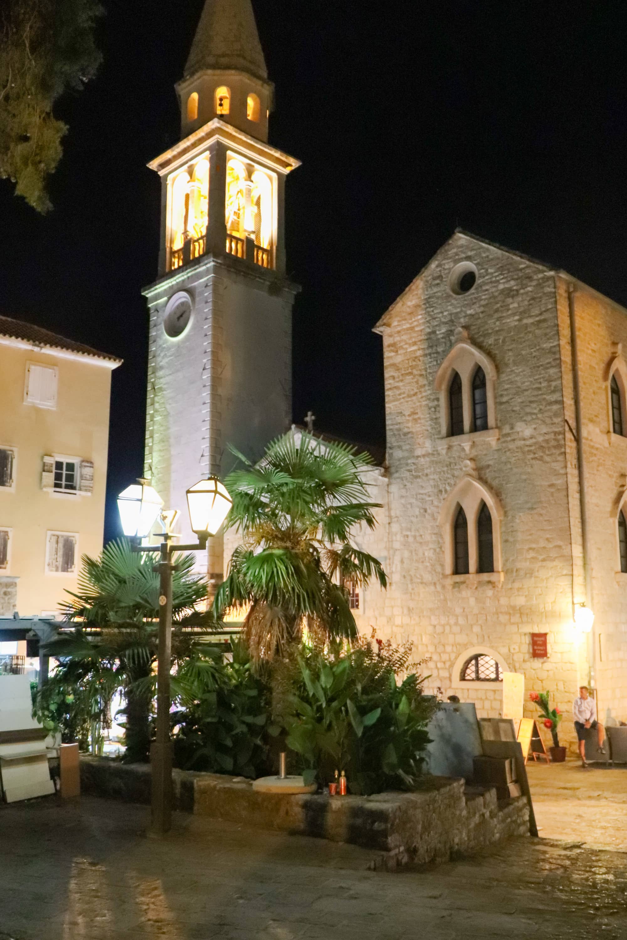 Clock tower in the Old Town of Budva in the evening. Montenegro.