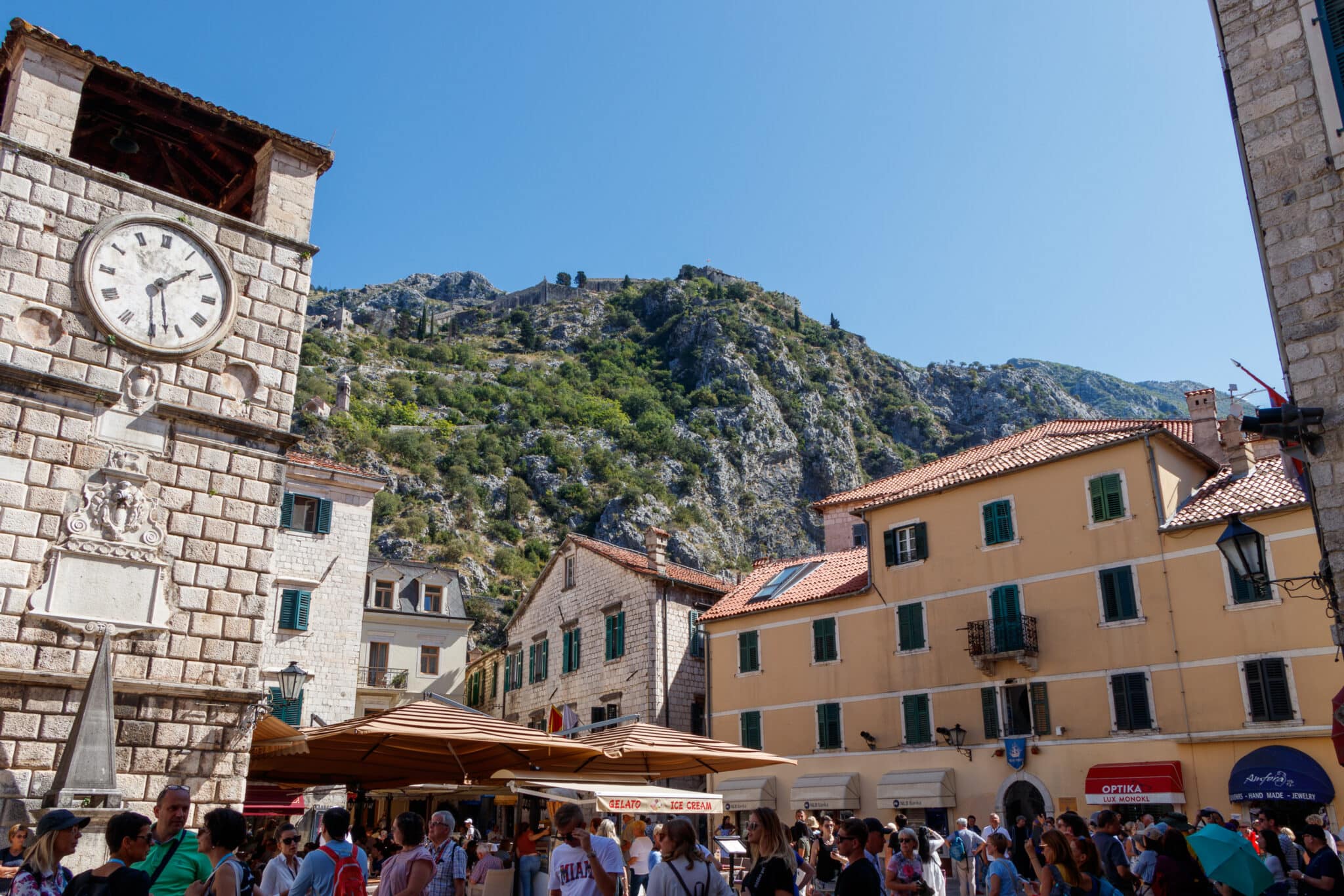 Clock tower and pillar of shame in the Old Town of Kotor, Montenegro