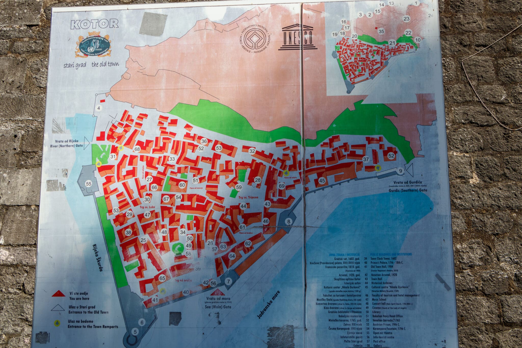 Map of Kotor with all the sights on the wall at the entrance to the city. Montenegro.