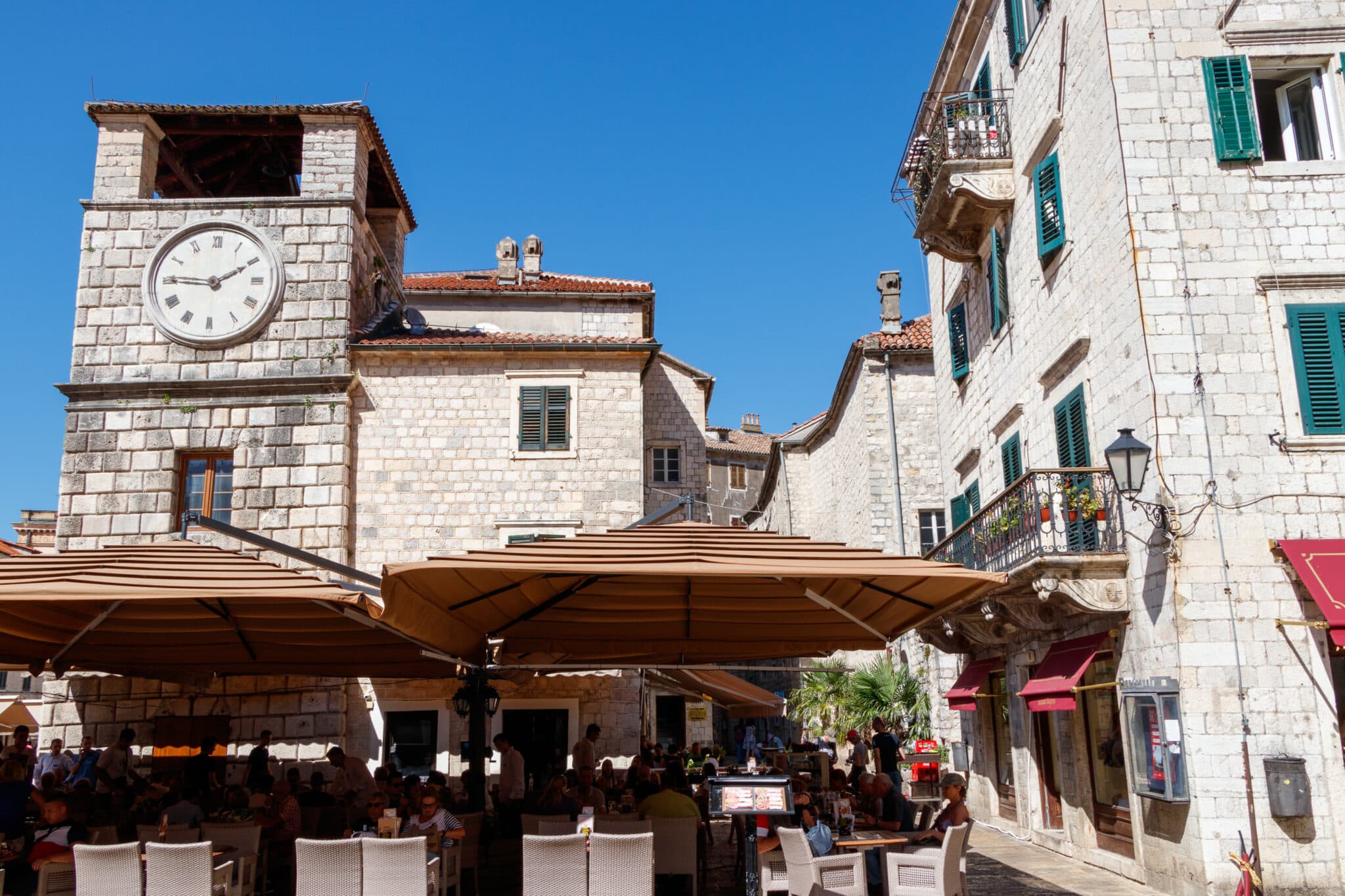 Restaurant near the walls of the clock tower in the Kotor Old Town in Montenegro